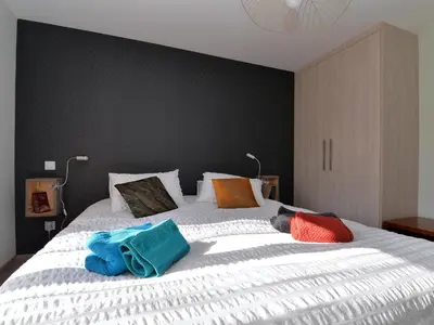 Un ou plusieurs lits dans un hébergement de l'établissement Charmant appartement rénové pour 4 pers avec terrasse à Hunawihr - FR-1-744-14