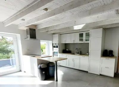 Cuisine ou kitchenette dans l'établissement Gîte des Rondins