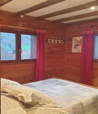Un ou plusieurs lits dans un hébergement de l'établissement Chalet le Grand Tétras
