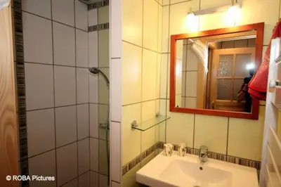 Salle de bains dans l'établissement Chalet le Grand Tétras