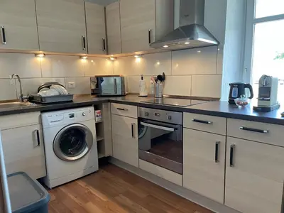 Cuisine ou kitchenette dans l'établissement Appartement la petite Venise
