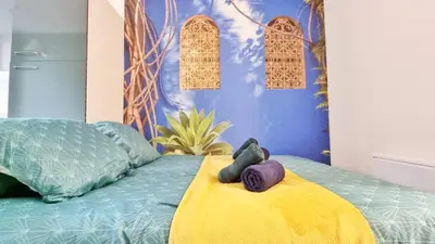 Un ou plusieurs lits dans un hébergement de l'établissement La Résidence Évasion 1 - Original - Gare - Wifi - Relax BNB