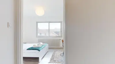 Un ou plusieurs lits dans un hébergement de l'établissement Appartement La Fecht + parking