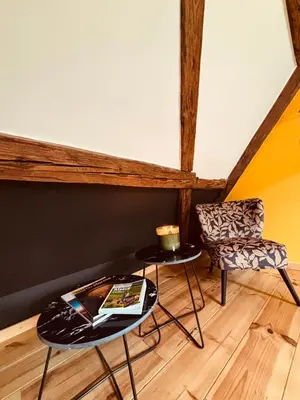 Coin salon dans l'établissement Gîte Origin Gueberschwihr