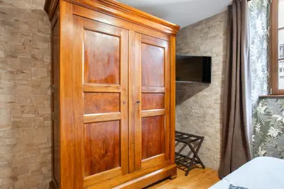 Télévision ou salle de divertissement dans l'établissement Appartement 12 personnes 4 suite privatives 160 m2 terrasse