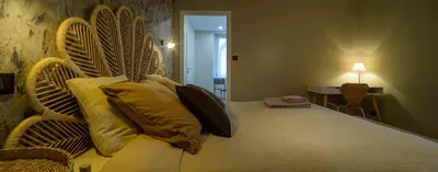 Un ou plusieurs lits dans un hébergement de l'établissement Gîte l'escapade 90