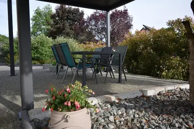 Jardin de l'établissement Gîte l'escapade 90