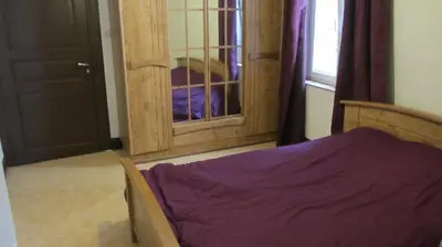 Un ou plusieurs lits dans un hébergement de l'établissement Gîte du Vignoble