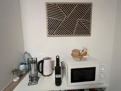 Cuisine ou kitchenette dans l'établissement Maison letiluca