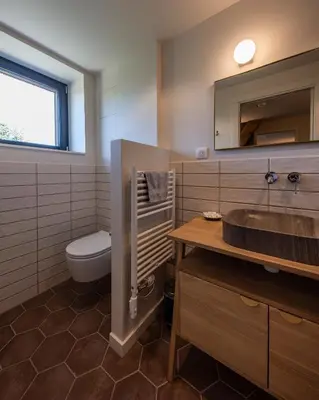 Salle de bains dans l'établissement Hôtel du DOMAINE SAINT LOUP