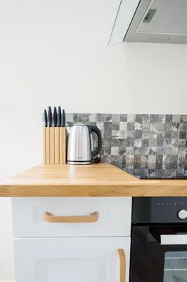 Cuisine ou kitchenette dans l'établissement La Nature by Leslodgespa - appartement confortable et ressourçant avec balcon, proche de Bâle et de l'aéroport