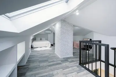 Un ou plusieurs lits dans un hébergement de l'établissement Le Duplex by Leslodgespa - Loft moderne et confortable au style newyorkais, proche de Bâle et de l'aéroport