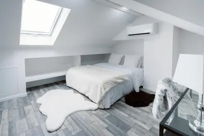 Un ou plusieurs lits dans un hébergement de l'établissement Le Duplex by Leslodgespa - Loft moderne et confortable au style newyorkais, proche de Bâle et de l'aéroport