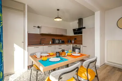 Cuisine ou kitchenette dans l'établissement Le 24-GregIMMO-Appart'Hôtel