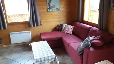 Coin salon dans l'établissement Chalet Airelles 4 pers - Tout Confort - Wifi fibre