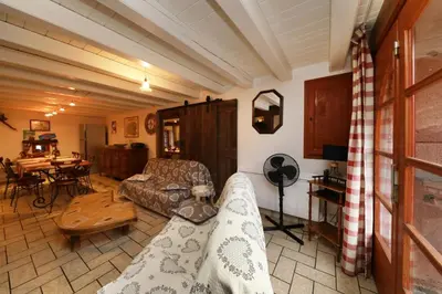 Coin salon dans l'établissement Gentiane fermette hautes vosges