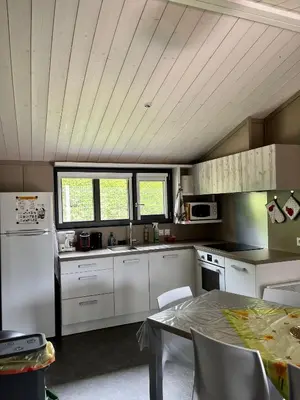 Cuisine ou kitchenette dans l'établissement Le Chalet de la Folie