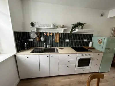 Cuisine ou kitchenette dans l'établissement Les Ateliers