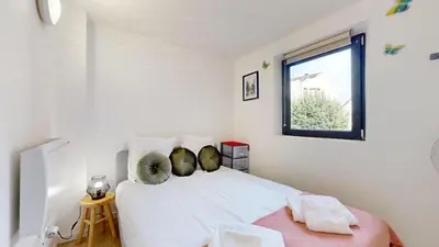 Un ou plusieurs lits dans un hébergement de l'établissement Le Charme Colmarien - Appartement 2 pièces au cœur de la ville