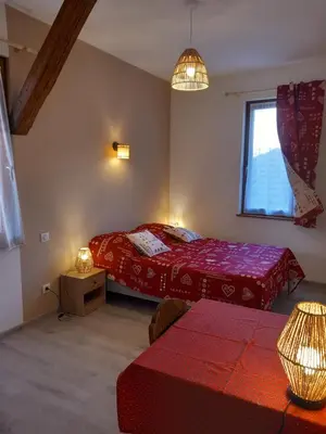 Un ou plusieurs lits dans un hébergement de l'établissement Gite Schlossberg