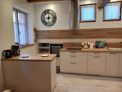 Cuisine ou kitchenette dans l'établissement Gite Schlossberg
