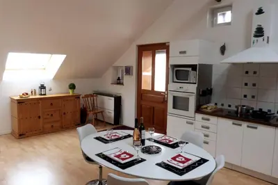Cuisine ou kitchenette dans l'établissement le Loft de Gérardmer - Cozy et spacieux