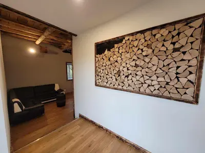 Télévision ou salle de divertissement dans l'établissement Gîte de la Ferme de la Comté