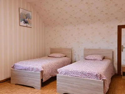Un ou plusieurs lits dans un hébergement de l'établissement Maison Alsacienne Confortable près de Colmar - Jardin, Parking, Équipements Bébé - FR-1-744-40