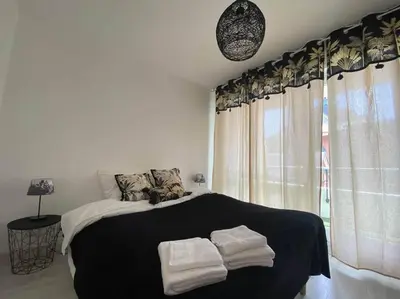 Un ou plusieurs lits dans un hébergement de l'établissement Esprit Mulhouse - 3 chambres de charme