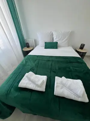 Un ou plusieurs lits dans un hébergement de l'établissement Le Cannois, Appartement de star 3 chambres