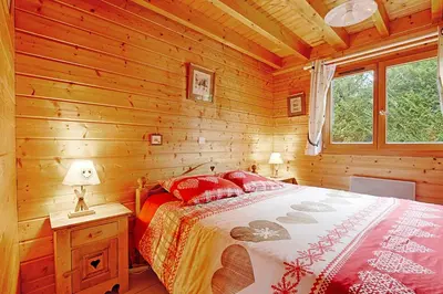 Un ou plusieurs lits dans un hébergement de l'établissement Le Chalet des Cœurs - Avec vue montagne