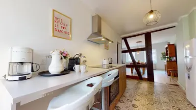Cuisine ou kitchenette dans l'établissement Le Petit Chez Vous
