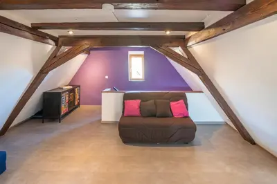 Coin salon dans l'établissement Appartement cosy et spacieux, 4 ch, parking - centre - Les Vieux Toits de Riquewihr