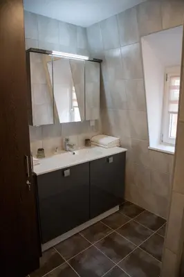 Salle de bains dans l'établissement Appartements Le Hupsa Pfannala