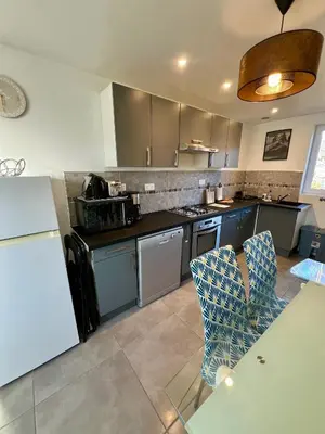 Cuisine ou kitchenette dans l'établissement Grand apt La Bresse 6 a 8 pers centre et pistes proches