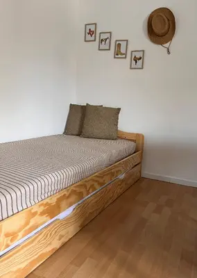 Un ou plusieurs lits dans un hébergement de l'établissement Nuit insolite au cœur d’un ranch proche d’Europa park