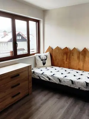 Un ou plusieurs lits dans un hébergement de l'établissement Gîte Papillon 6 à14 personnes - Jacuzzi