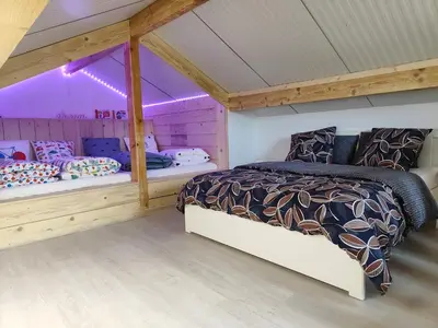 Un ou plusieurs lits dans un hébergement de l'établissement Gîte indépendant au calme 