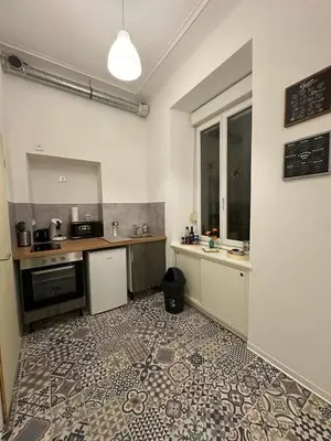 Cuisine ou kitchenette dans l'établissement Le Petit Café - Centre ville, parking gratuit