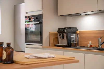 Cuisine ou kitchenette dans l'établissement Chambre Pin Up Wings