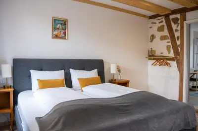 Un ou plusieurs lits dans un hébergement de l'établissement Chambre Pin Up Wings