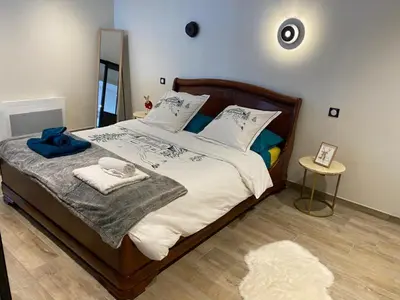 Un ou plusieurs lits dans un hébergement de l'établissement Charmant appartement 3* au cœur des Vosges (PMR)