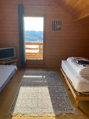 Un ou plusieurs lits dans un hébergement de l'établissement CHALET CATHOGUI