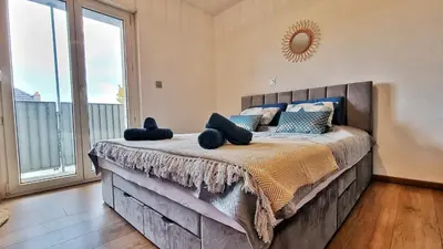 Un ou plusieurs lits dans un hébergement de l'établissement Le City View - Calme - Moderne - Balcon - RelaxBNB