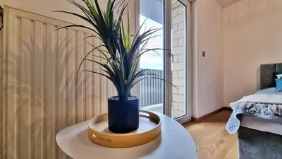 Un ou plusieurs lits dans un hébergement de l'établissement Le City View - Calme - Moderne - Balcon - RelaxBNB