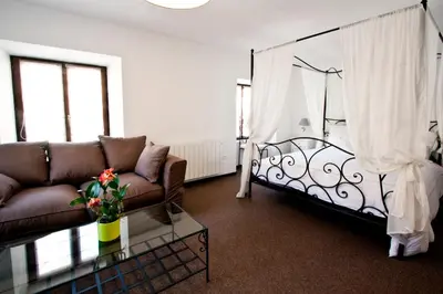 Un ou plusieurs lits dans un hébergement de l'établissement Chambre Le Hupsa Pfannala