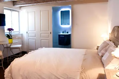 Un ou plusieurs lits dans un hébergement de l'établissement Chambre Le Hupsa Pfannala
