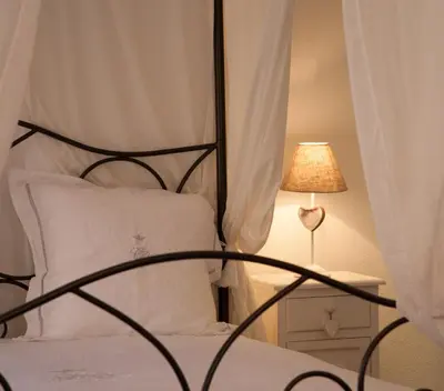 Un ou plusieurs lits dans un hébergement de l'établissement Chambre Le Hupsa Pfannala