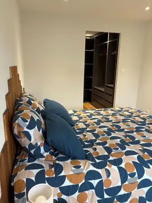 Un ou plusieurs lits dans un hébergement de l'établissement Coco Room Colmar
