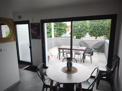 Coin salon dans l'établissement Près Colmar 6 bis